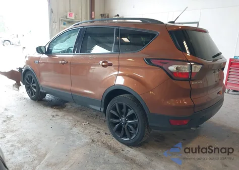2017 Ford Escape Titanium z USA, uszkodzony, nr VIN 1FMCU0JD0HUE22563
